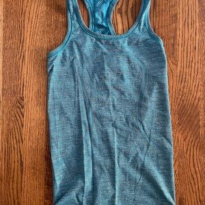 Women’s teal Lululemon swiftly tech tank. Size 2. VGUC!